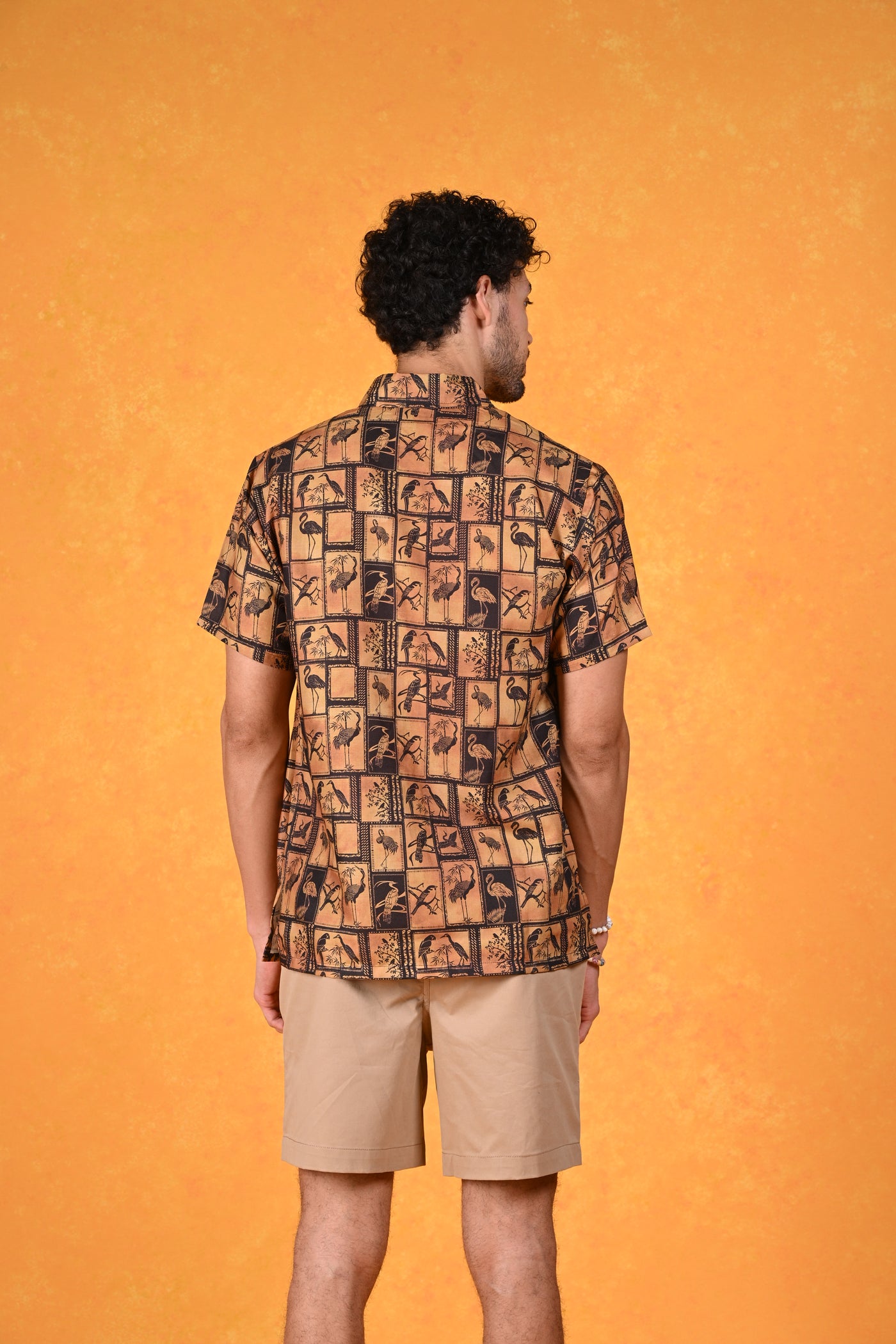 Wild N' Free | Flight of the Tropics Black and Gold Hawaiian Shirt