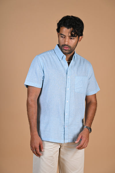 Blue linen summer shirt — ideal for beachside style in Spain. Get yours today!